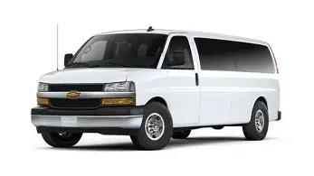 White Chevy Express 3500 15-passenger van, side view